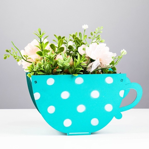 imagem do arquivo vetor para download Vaso de flores na forma de um copo de chá