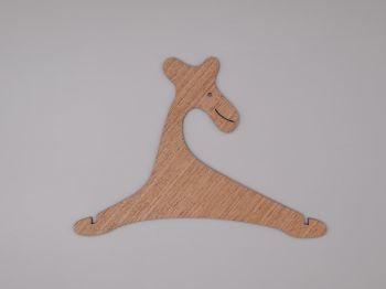 imagem do arquivo vetor para download Cabideiro de Girafa para Roupas de Bebê