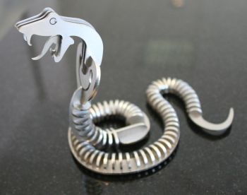 imagem do arquivo vetor para download Quebra cabeça de Cobra 3mm